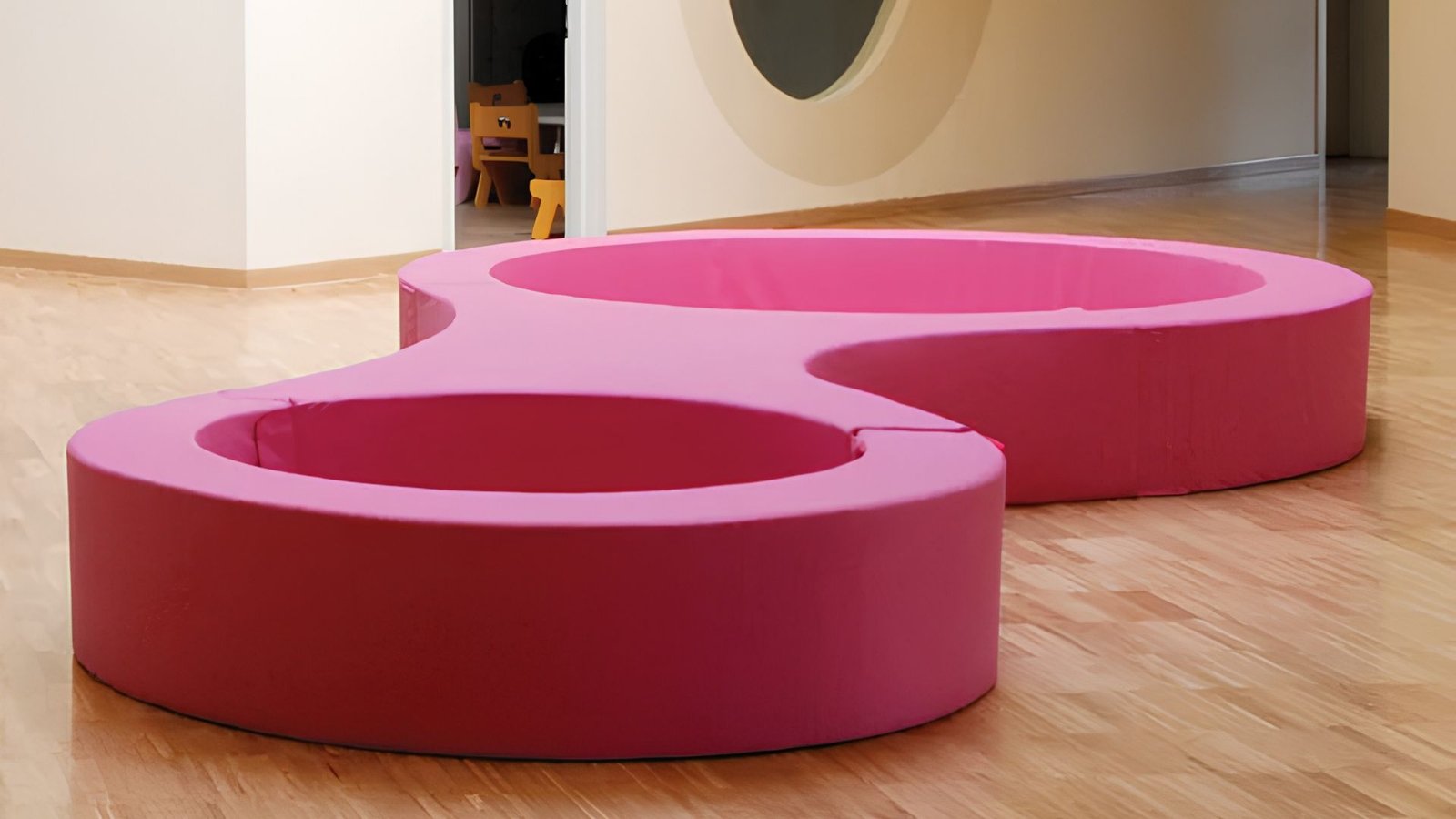 Soft play enclosure designed for storytelling and social interaction