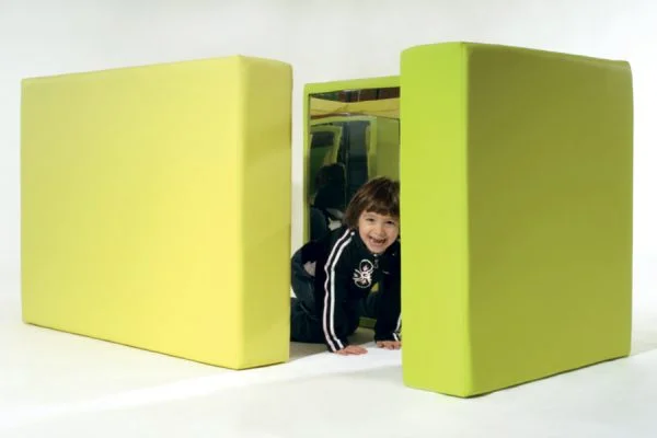 Modular mirror panels that create reflective play spaces for sensory exploration, movement and imaginative discovery.