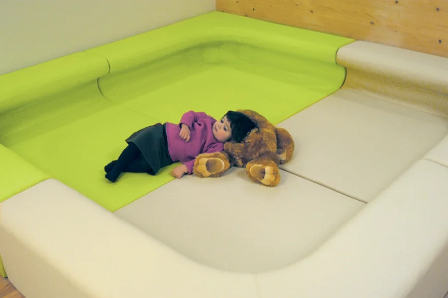 Enclosed soft seating system for reading and quiet play